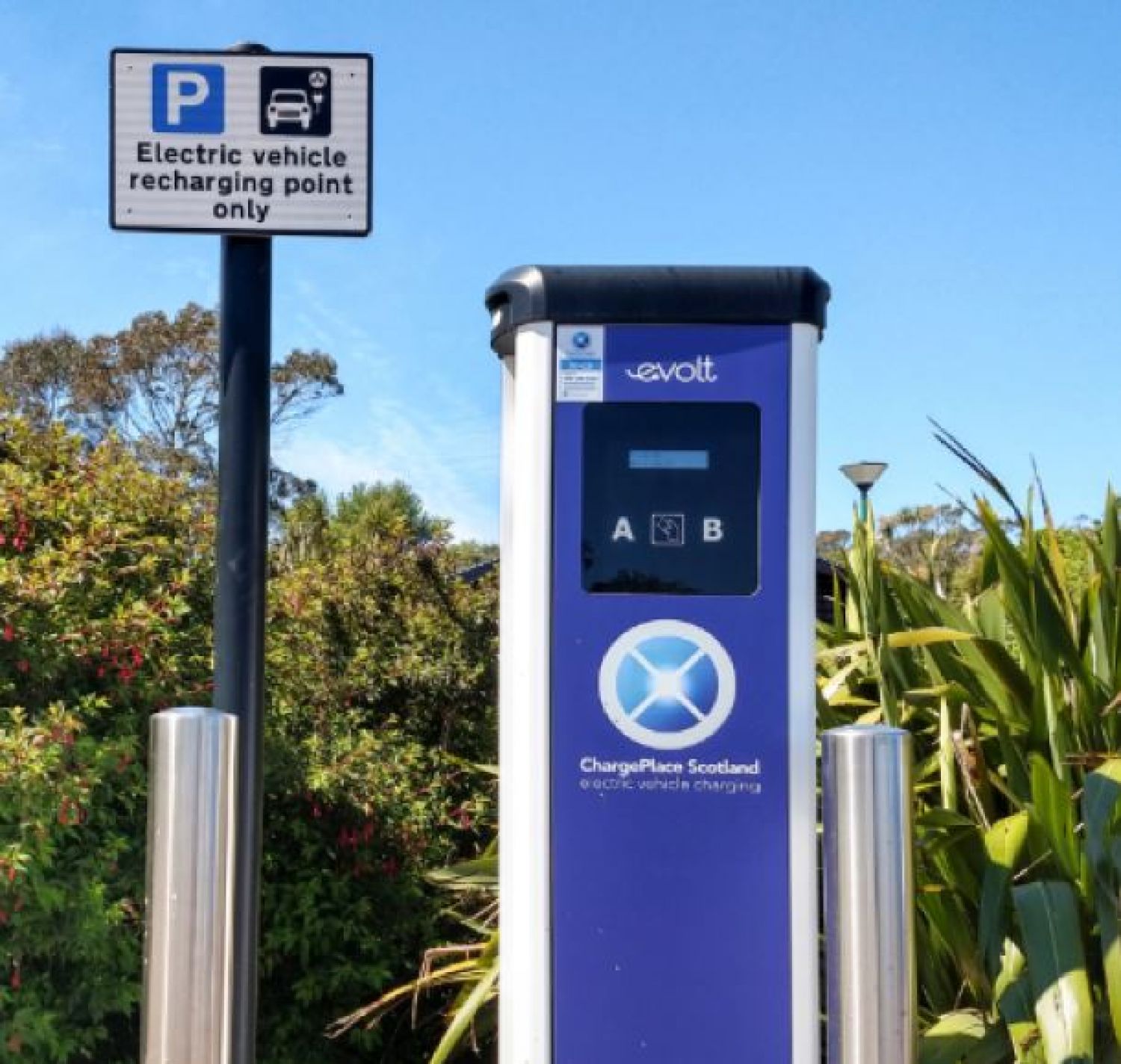 Electric vehicle car charger and sign